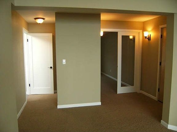 French doors lead into  bedroom