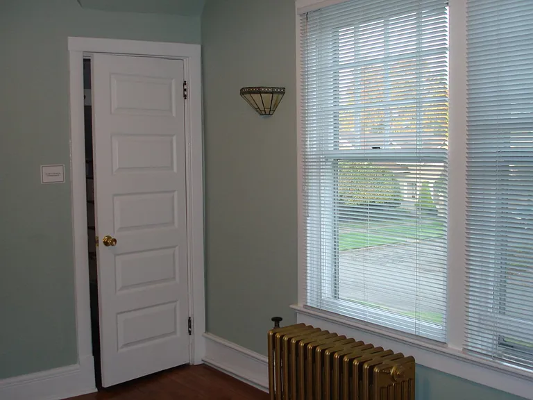 Second Bedroom, Hardwood floors
Radiant Heat, Radiator warm not hot,
Closet Door ajar.