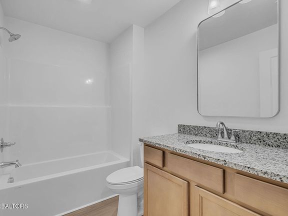4th image of 8539 Troutman Ln