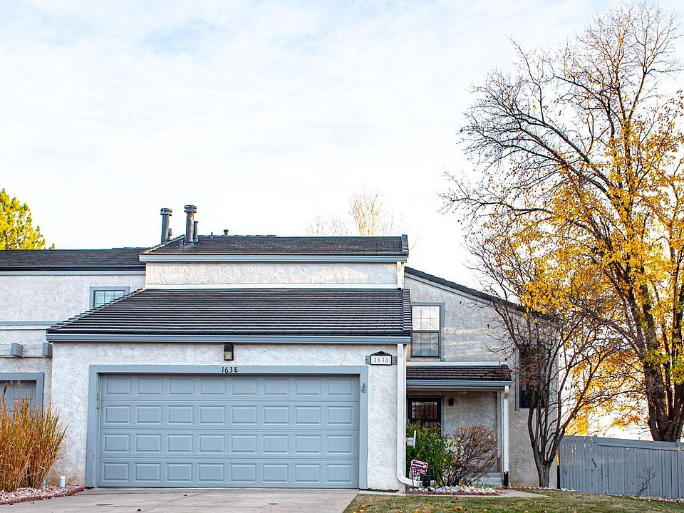 Two car garage, front of house.