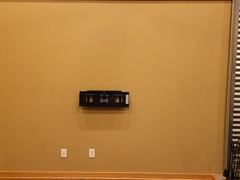 Living Room wall mount for a large TV.