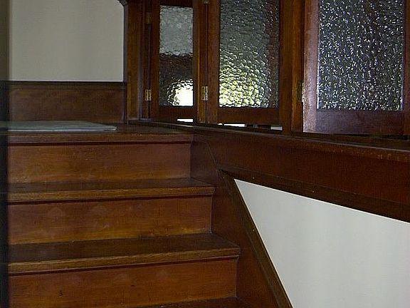 Window accents on stairs (see top left of front room image