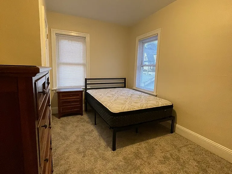 Old bedroom furniture with new bed. See the new pictures with light colored wood .
