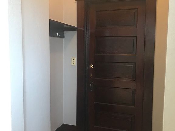 Entryway. (Photo is of a mirror-image apartment.)