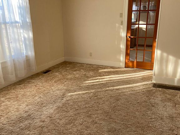 Family room with door to kitchen