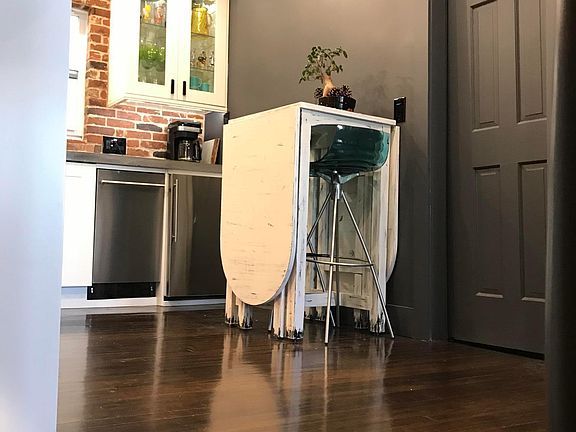 Kitchen table opens up to 8 feet for 6-8 people to stand or sit around.
