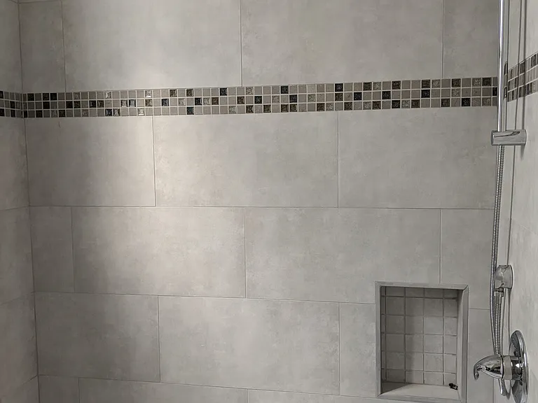 washtub and shower in ensuite bathroom