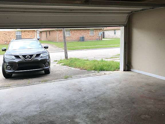 Spacious 2 car garage with remote operation.