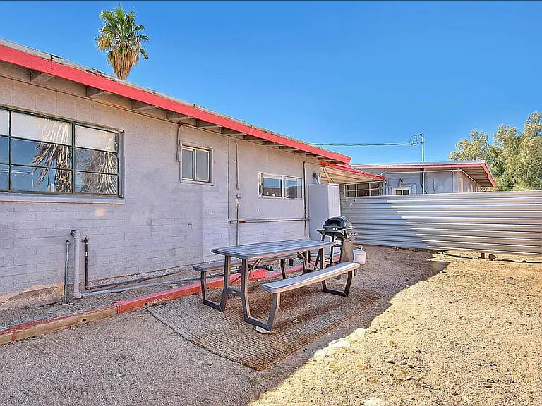 Backyard with seating area.
