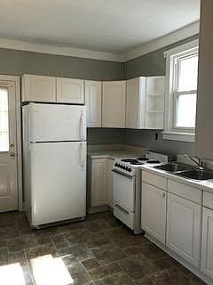 Kitchen adjoins small dining area