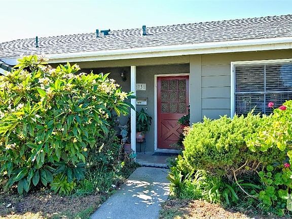 Original refurbished front door. Charming entry.