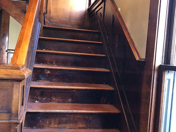 Bottom stairs up to the unit