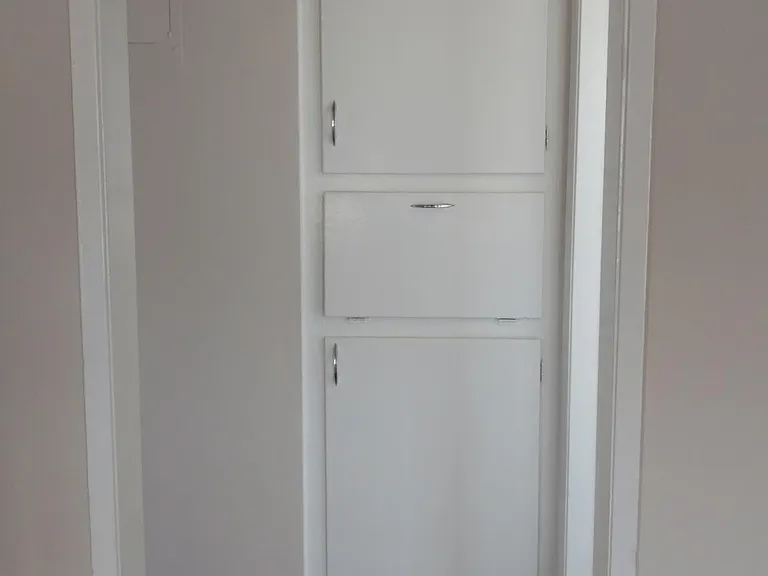 Linen closets in hallway