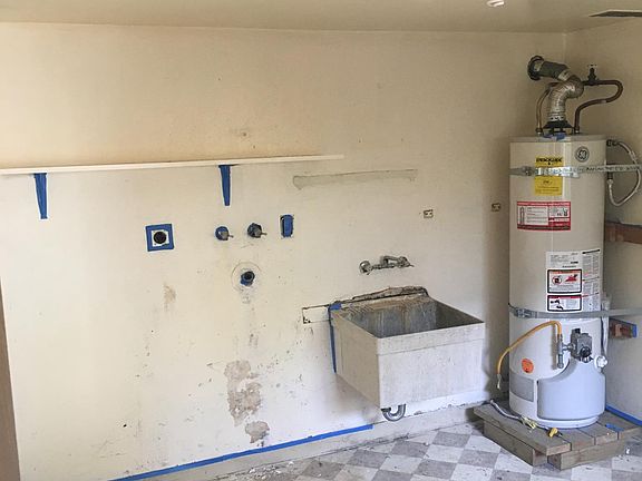 Private Separate Large Laundry Room off Garage
