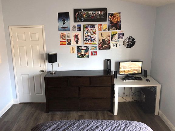 Master bedroom with vaulted ceilings and master bathroom. Easily fits a queen size bed, large dresser, and small desk. Pt 1