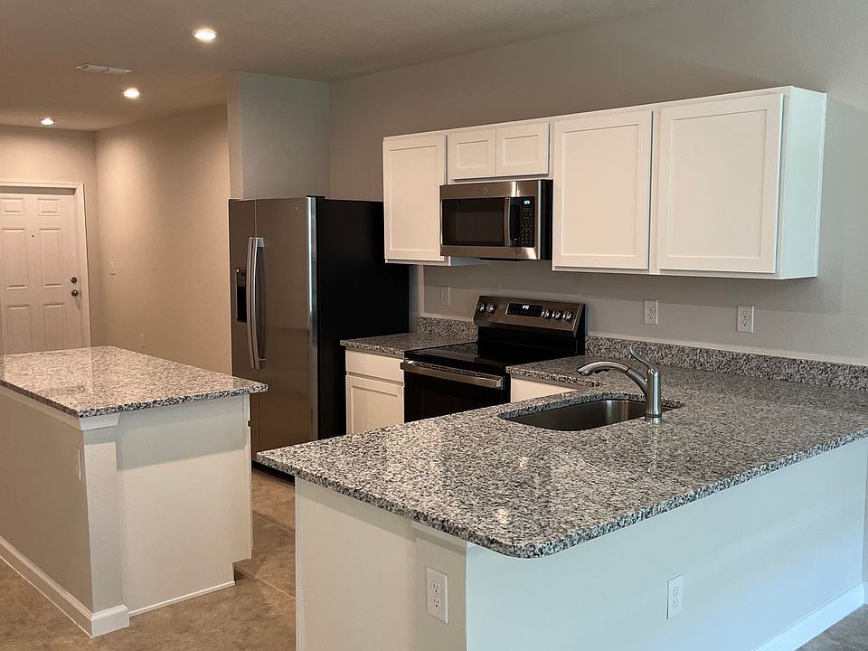 Open Kitchen with Granite Counter Top