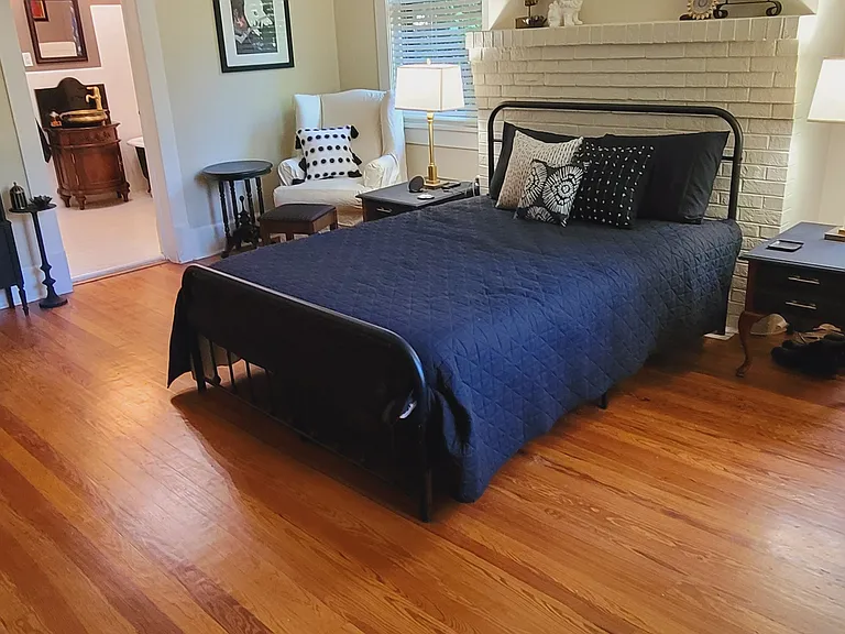 Front bedroom on main floor. Beautiful hardwood floors with door to shared jack and jill bathroom.