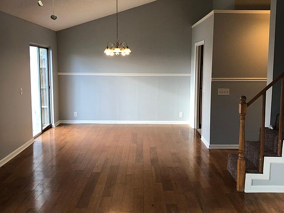 Dining room portion of huge dining room / living room combo