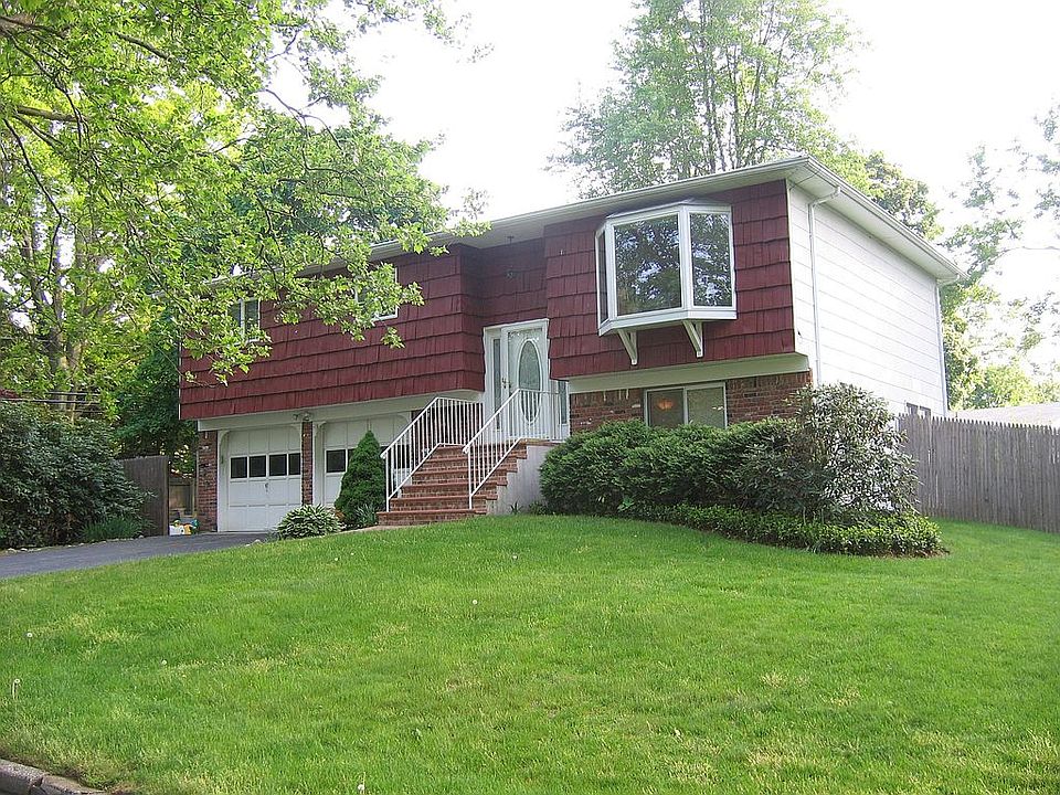 At the top of a gorgeous, tree-lined, family-friendly cul-de-sac