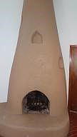 Warm Kiva Fireplace with Nichos