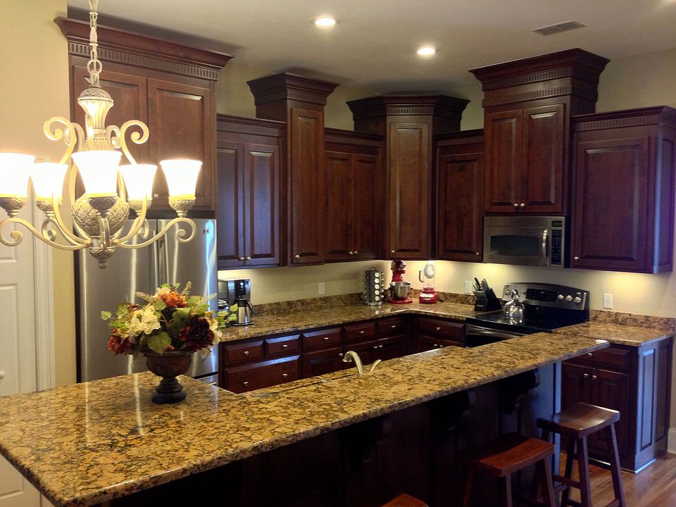 Custom solid wood cabinets that soar to the 10' kitchen ceiling. 