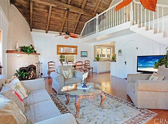 Living room with beamed ceiling