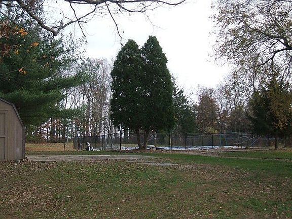 Spacious backyard with in-ground pool