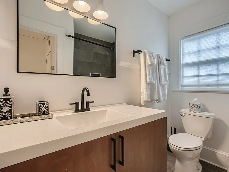 Guest bathroom with bathtub and shower