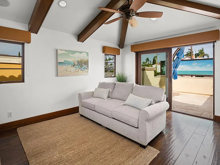 Upstairs TV room with couch sofa bed and balcony, fireplace, TV