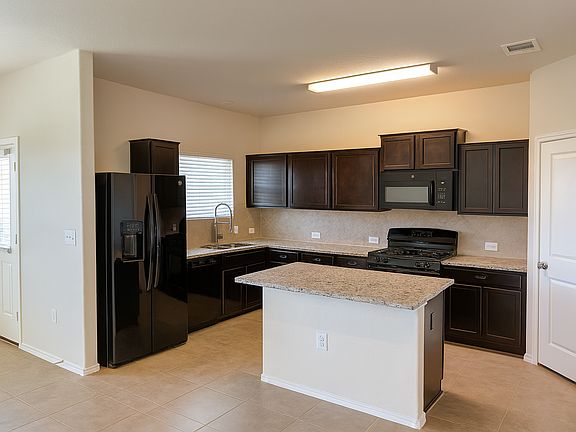 Kitchen with island bar