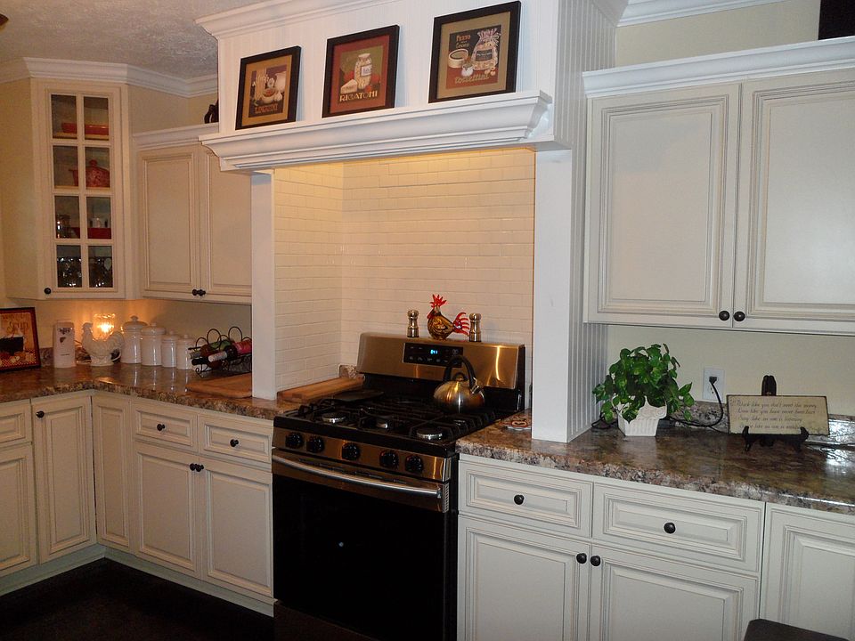 Subway tile stove enclosure
