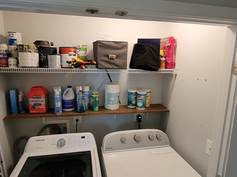 Laundry closet with lots of storage space