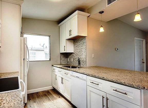 Granite Counters with Glass Tile Back Splash