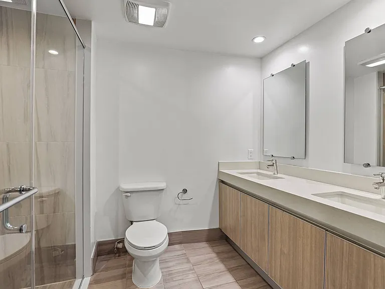 Bathroom with Double-Sink Vanity and Walk-In Shower
