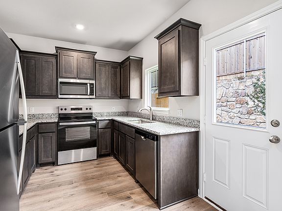 The kitchen has energy-efficient appliances.