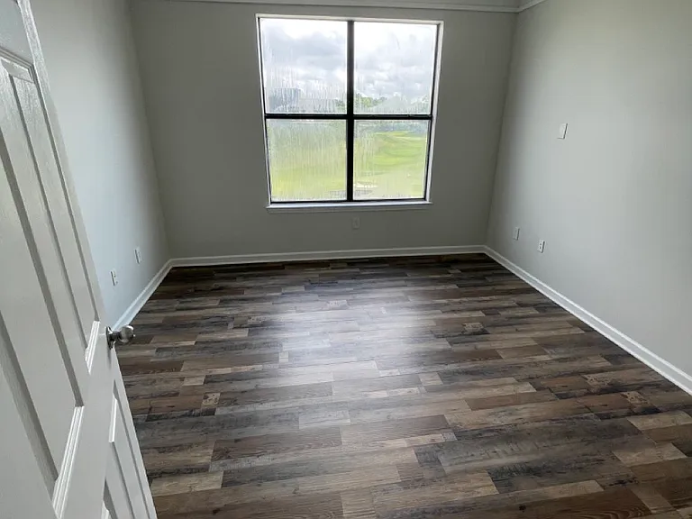 Bedroom with new LVP flooring