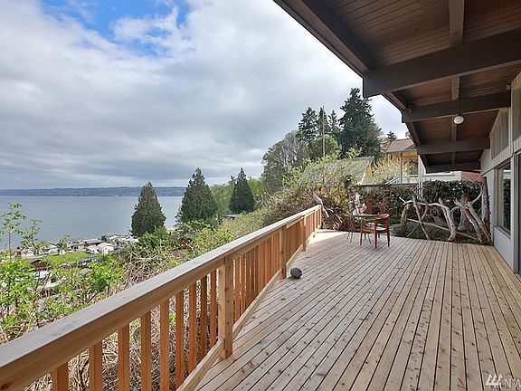 New deck (2019) for your viewing pleasure. Unobstructed expansive views. Note that most of the deck is covered for year round enjoyment. 