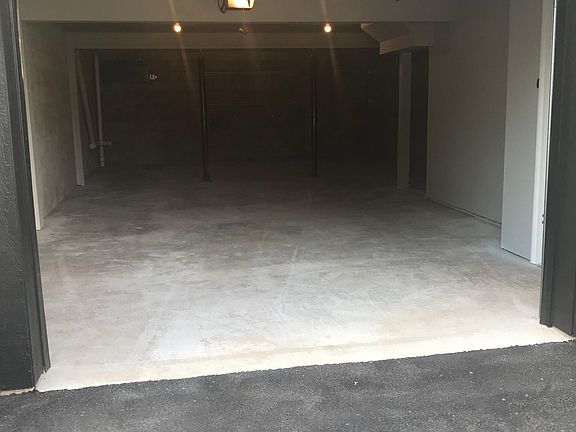 Garage at street level with basement in rear