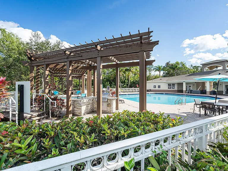 Grill, dine, and relax at your pool deck