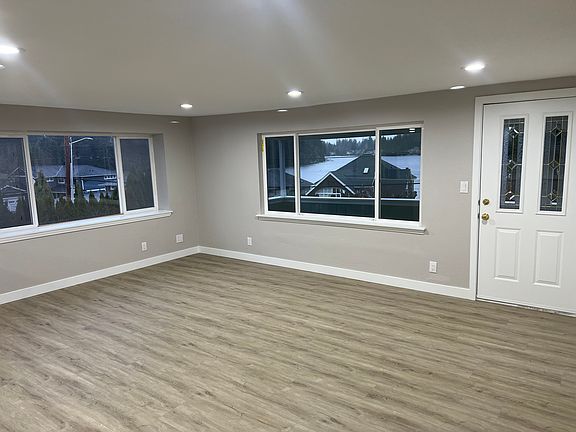 Large living room with views of Martha Lake
