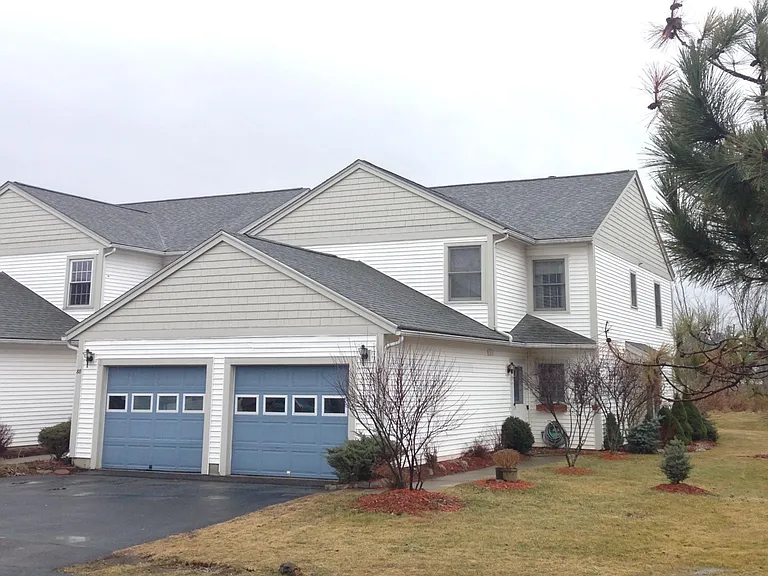 Unit is adjacent to bikepath with views of sunset, open meadow leading up to woods