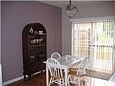Dinning area provides space for kitchen table & cabinets