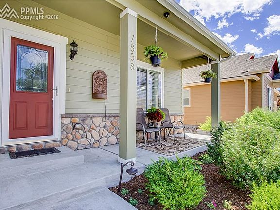 Front porch ideal for enjoying the beauty Colorado offers