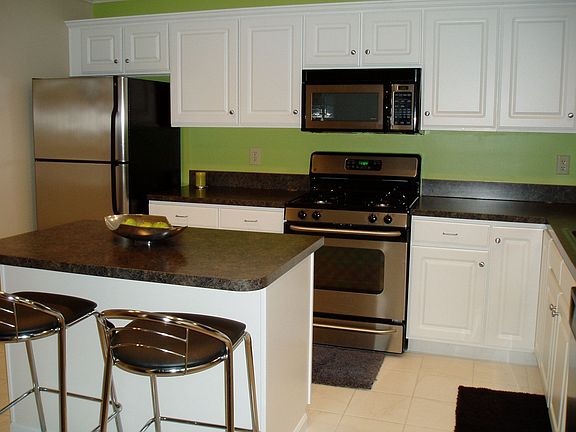 Island in the kitchen with stainless steel appliances