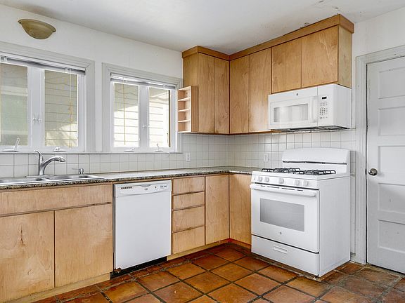 Updated cabinets and counter tops. Gas stove.