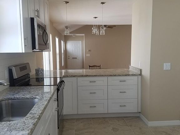 Kitchen and open floor plan to great room