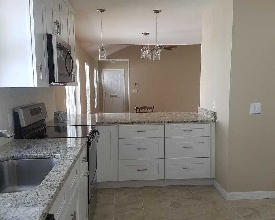 Kitchen and open floor plan to great room