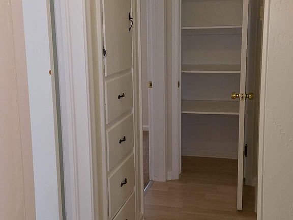 Hallway to two other bedrooms