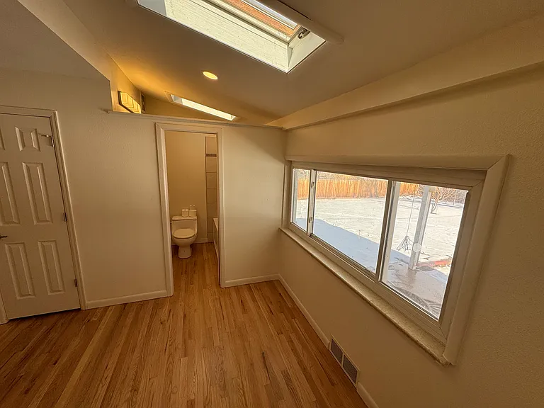 Master bedroom with entry to attached (private) bathroom