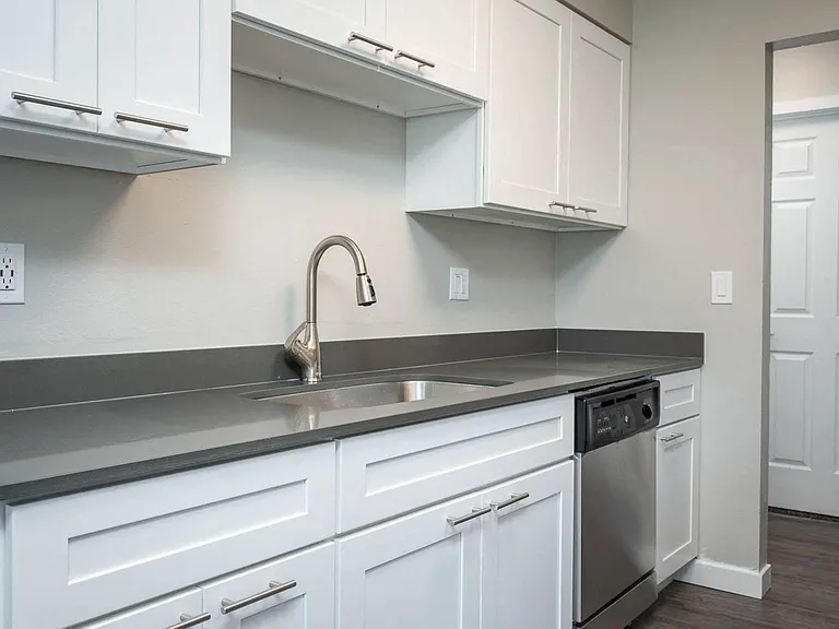 Vantage at Hillsdale | #36 Kitchen with White Cabinetry and Black & Stainless Steel Appliances